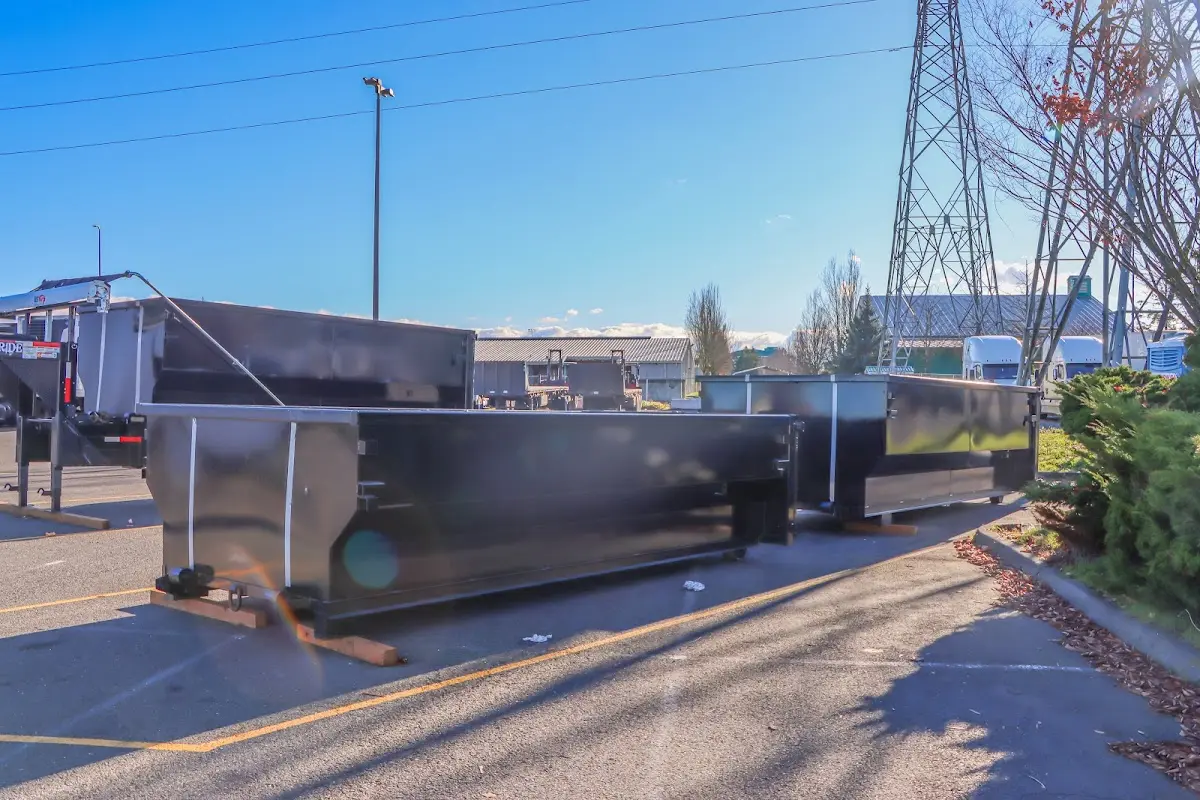 Roll-off dumpster ready for waste disposal at job site for 4 Yard Dumpster Rental in Salem